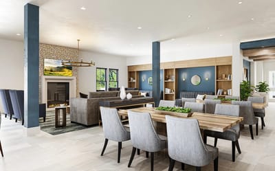Bright common area with seating and decorative elements