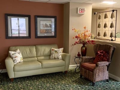 Cozy common area with a sofa and decorative accents