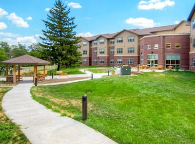 Exterior view of Fort Des Moines Senior Housing with outdoor space