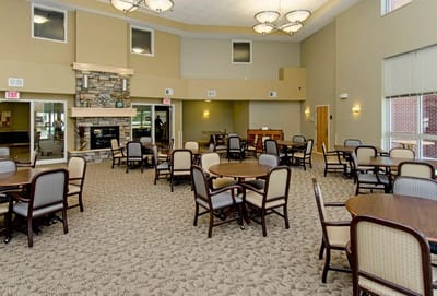 Interior view of a common area with tables and chairs