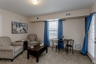 Cozy private resident room with furniture and decor
