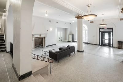 Interior view of a spacious lobby with seating