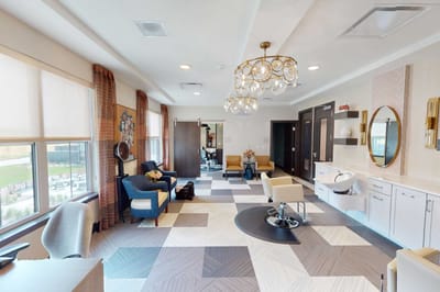 Bright interior common area with seating and decor