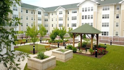 Outdoor garden area with seating and gazebo