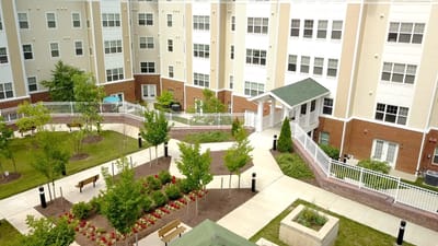Aerial view of the courtyard and building at Churchill Senior Living