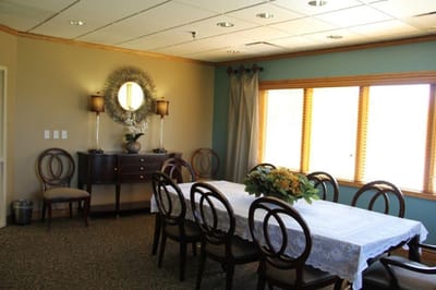 Interior dining room with a large table and chairs