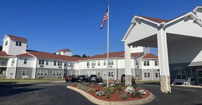 Front entrance of Antioch Valley Senior Living with flag