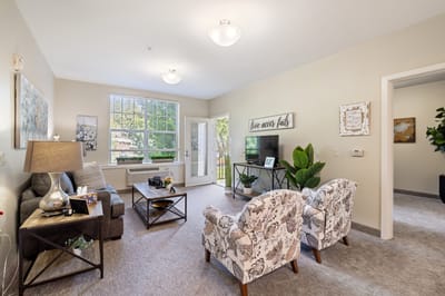 Bright common area with seating and decor