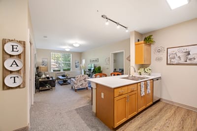 Bright common area featuring a cozy living space