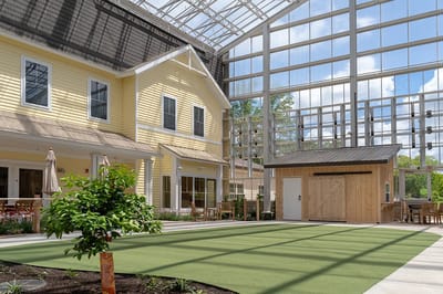 Indoor garden space with seating and natural light