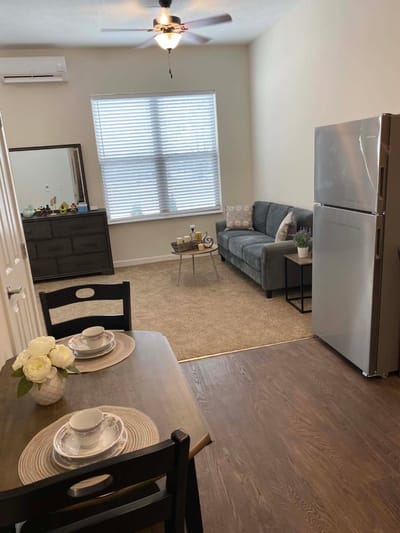 Interior view of a cozy resident room with furnishings