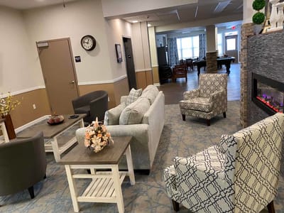 Cozy common area with seating and fireplace