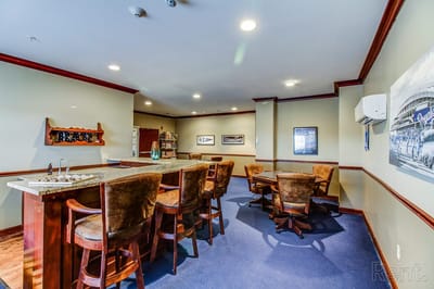 Interior view of a lounge area with seating and bar