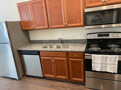 Well-equipped kitchen in a modern senior living unit