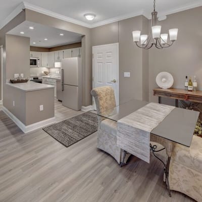 Interior view of a modern dining area with kitchen