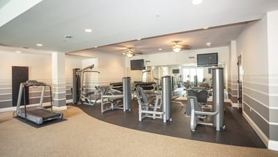 Interior view of a fitness room with exercise equipment