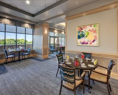Interior dining area with tables set for meals