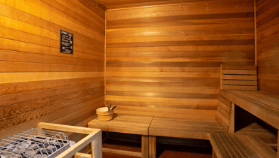 Interior view of a sauna with wood paneling