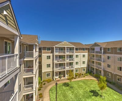 Exterior view of the facility courtyard and building