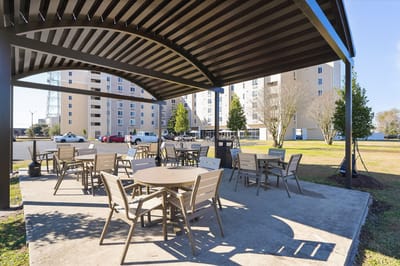 Outdoor seating area with building in background