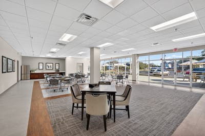 Bright common area with tables and chairs