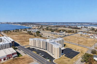 Aerial view of Magnolia Heights building near water