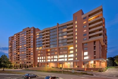 Exterior view of Edenwald Senior Living facility at dusk
