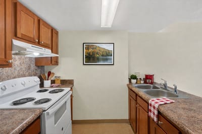 A well-lit kitchen area in a senior living facility