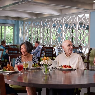 Residents enjoying a meal in the dining room
