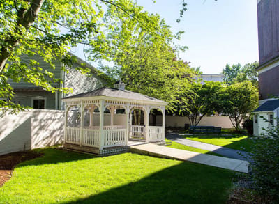 Outdoor gazebo in a landscaped garden area