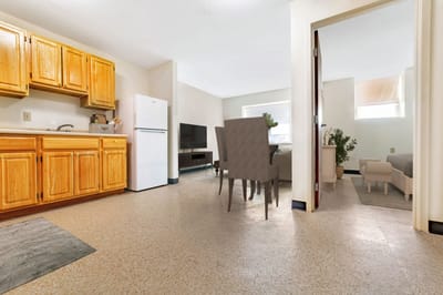 Interior view of a resident room and kitchen