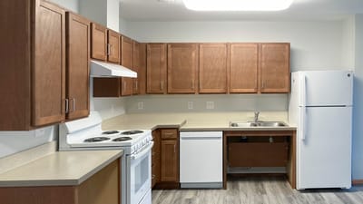 Interior view of a kitchen in a senior living unit