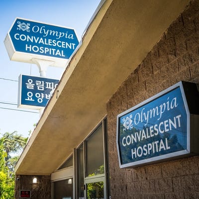 Exterior signs of Olympia Convalescent Hospital