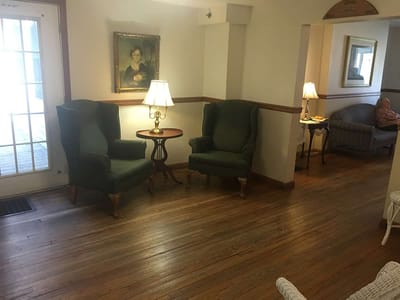 Cozy common area with seating and residents