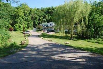 View of the facility building set in outdoor landscape