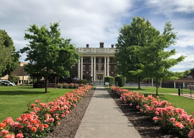 Exterior view of Washington Odd Fellows Home with a garden path