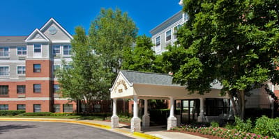 Exterior view of Pin Oak Village building entrance