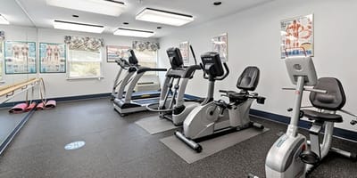 Fitness room with exercise equipment