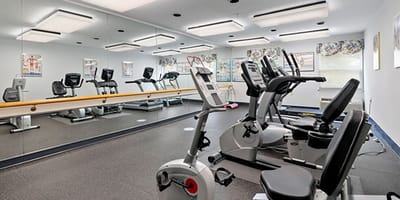 Interior view of a fitness room with exercise equipment