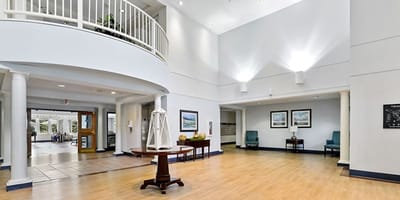 Interior view of a welcoming lobby in Pin Oak Village