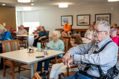 Residents engaging in a common area activity.