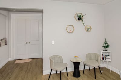 Cozy seating area with plants and decor