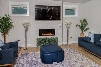 Cozy common area with comfortable seating and decorative elements.