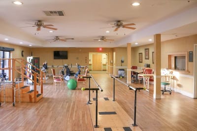 Interior view of a rehab and activity area with equipment.