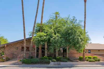 Exterior view of the facility with greenery