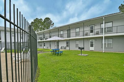 Outdoor area with tables and chairs at the facility
