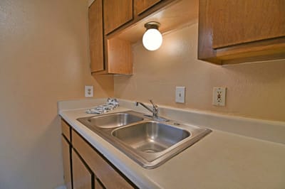 Kitchen sink area in an apartment