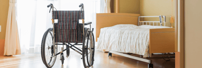 A wheelchair in a resident room