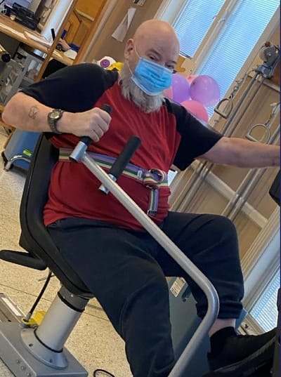 Resident engaged in exercise activity