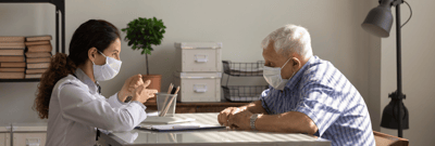Staff member engaged in conversation with resident
